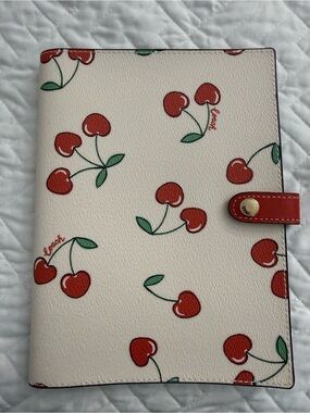 Coach cherry print notebook cover